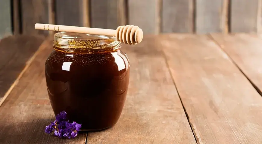 A jar of dark Buckwheat Honey.